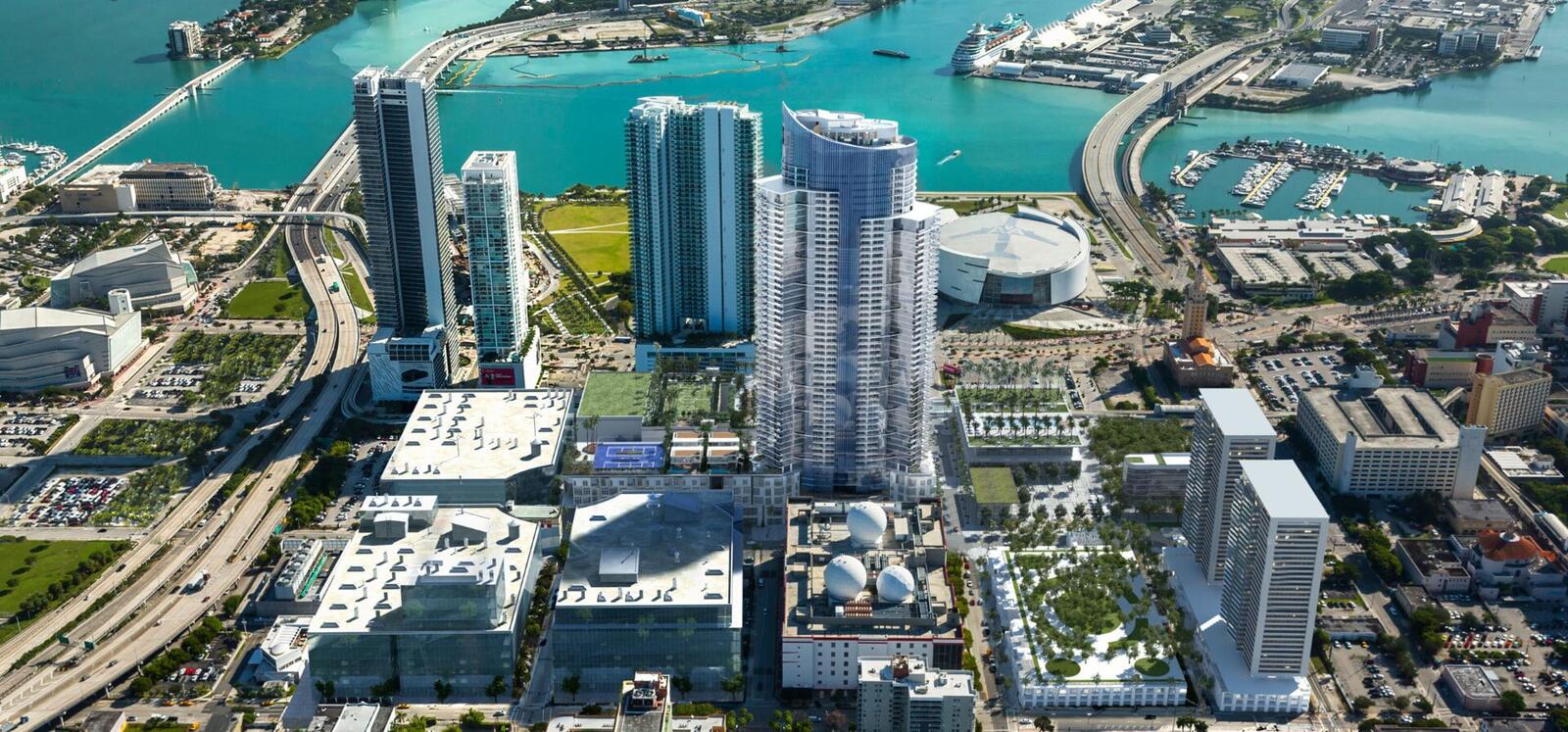 Aerial view of the Miami Worldcenter towers with Biscayne Bay and the Downtown Miami skyline